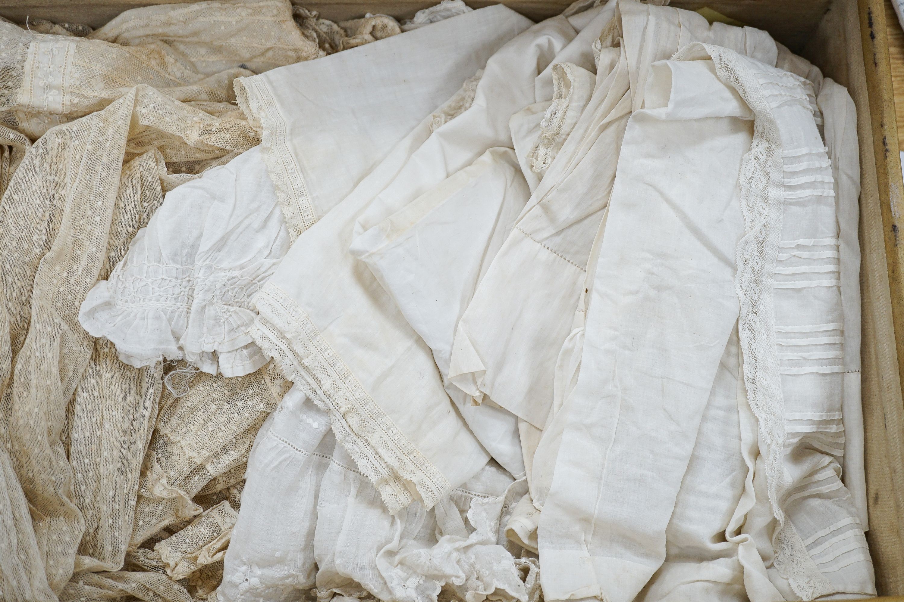 Various christening gowns, 2 dresses in a suitcase